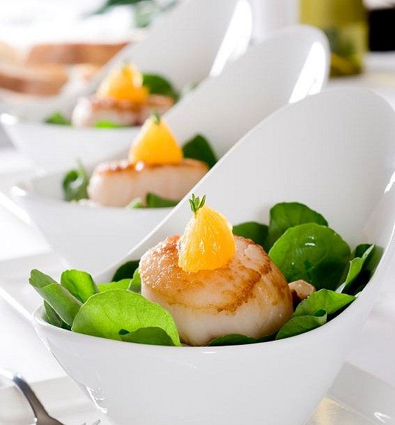 Noix de St Jacques poêlées et sa salade de pousses d'épinards